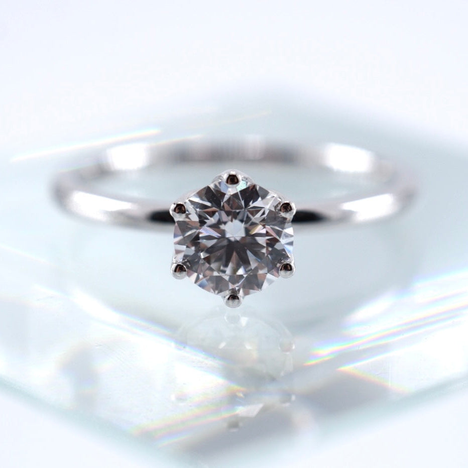 Round Brilliant Solitaire Ring With Petal Prongs